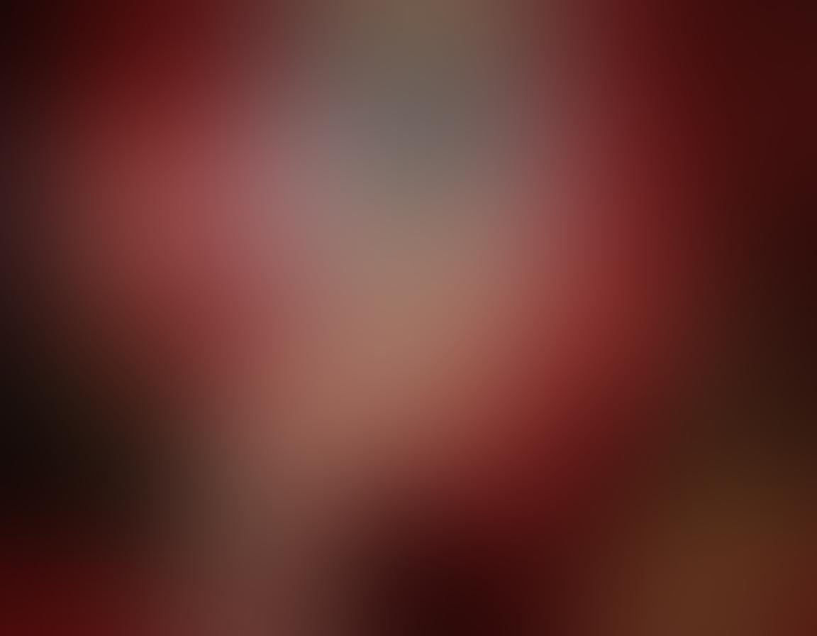 A dynamic collage showcasing a glamorous and sophisticated adult entertainment scene, featuring stylish decor, luxurious settings, and artistic representations of models engaged in various forms of erotic expression. Include subtle hints of premium films through film reel motifs and an elegant color palette of reds, golds, and blacks. The background should evoke a sense of intrigue and allure, inviting the viewer into a world of sensuality. glossy finish, vibrant colors, digital art.